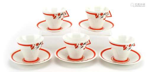 Shelley, five Art Deco mode shaped cups and saucers, each cu...