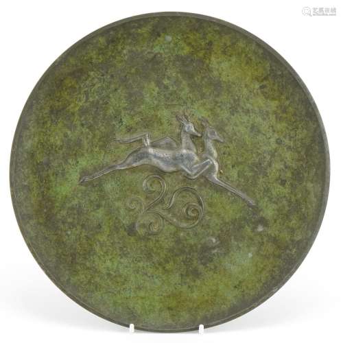Scandinavian cast metal plate decorated in relief with two l...