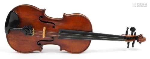 Old wooden violin with one piece back and case, the violin b...
