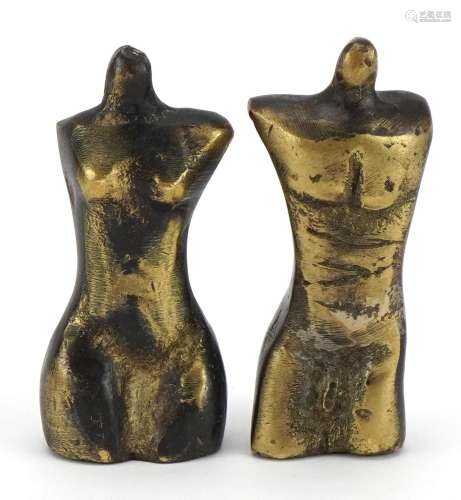 Pair of mid century Modernist male and female bronze torsos,...