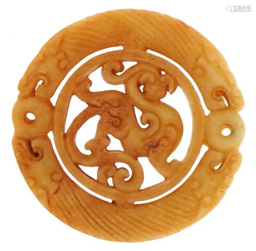 Chinese russet hardstone disk carved with dragons, 7.2cm in ...