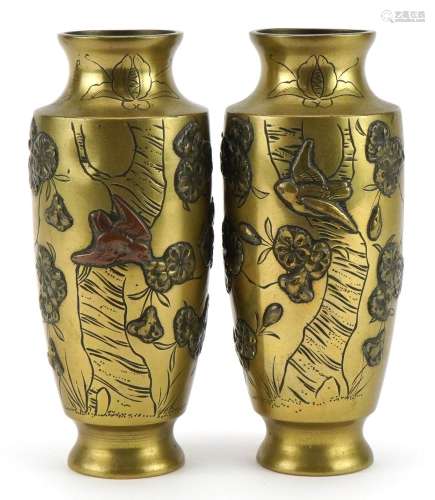 Pair of Japanese bronze vases decorated in relief with birds...