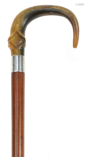 Wooden walking stick with carved horn handle and silver coll...