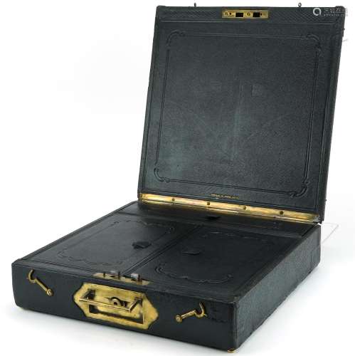 Tooled leather folding Campaign writing box with brass mount...