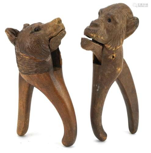 Two carved Black Forest wooden nutcrackers including one in ...