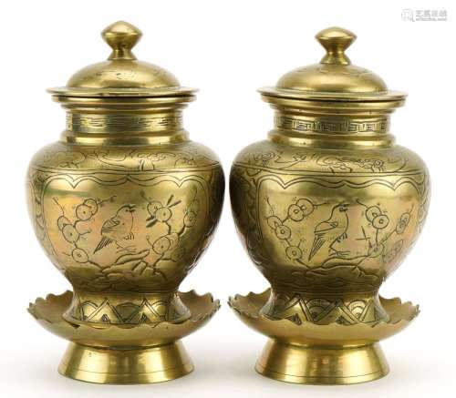 Pair of Chinese bronze vases and covers with stands and engr...