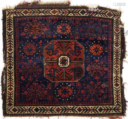 Afghan red and blue ground Belutch rug with all over geometr...