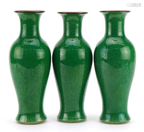 Garniture of three Chinese porcelain baluster vases having g...