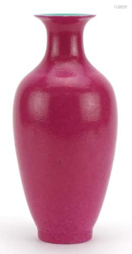 Chinese porcelain vase having a pink glaze, four figure iron...