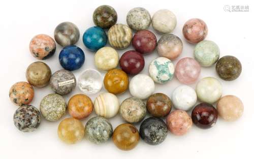 Collection of polished rock and mineral specimen orbs includ...