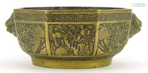 Chinese patinated bronze censer with animalia handles, chara...