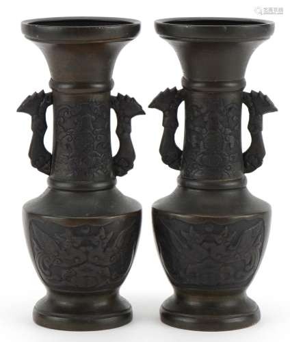 Pair of Japanese patinated bronze vases, each with phoenix h...