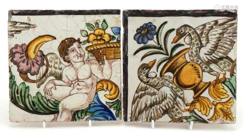 Two large Italian pottery tiles hand painted with a winged f...