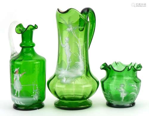 Two Victorian Mary Gregory green glass jugs and a frilled va...