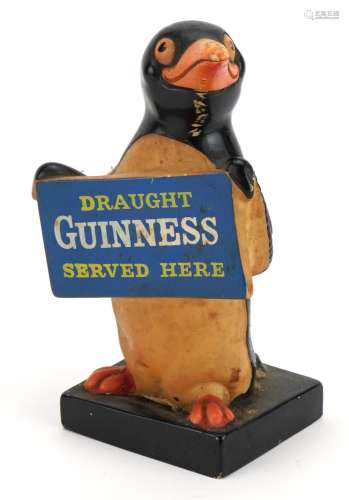 Vintage Guinness Ruberoid advertising figure with Charles E ...