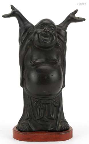 Chinese patinated bronze figure of Buddha raised on a hardwo...