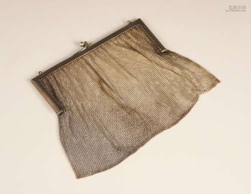 An early 20th century continental silver coloured mesh purse...