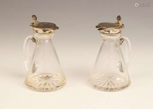 A pair of George V cut glass silver mounted whiskey noggin, ...