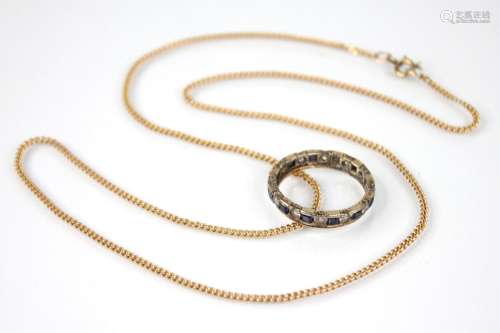 A 9ct gold curb link chain, with spring ring and loop fasten...