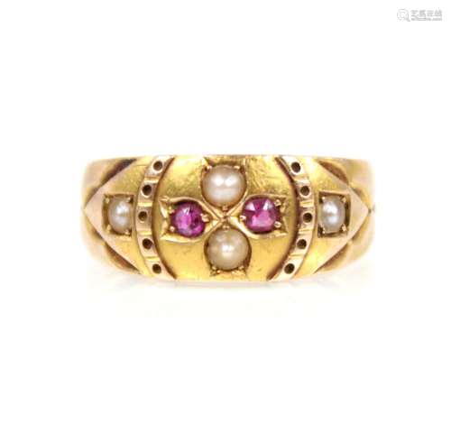 A Victorian ruby and pearl 15ct gold ring, the central flora...