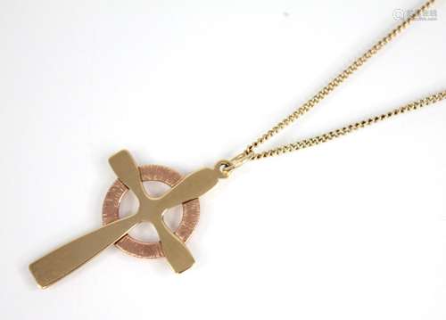 A Clogau 9ct gold cross pendant, in yellow and rose gold hue...