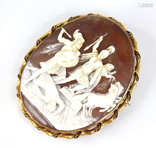 A 19th century carved shell cameo brooch, the oval carved ca...