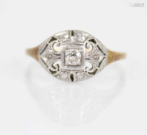 An early 20th century diamond ring, the central old cut diam...