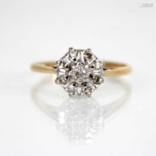 A diamond floral cluster ring, the central brilliant cut dia...