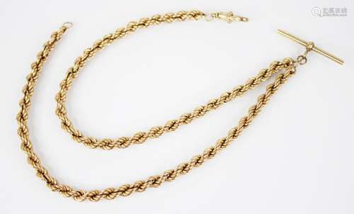 A 9ct gold albert chain, designed as two rope-twist chains s...