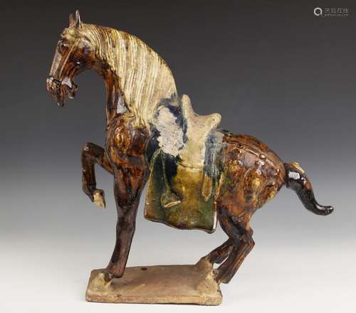 A Chinese sancai glazed pottery model of a Fereghan horse, p...