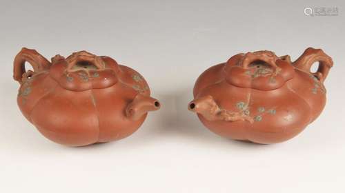 A pair of Yixing teapots and covers, early 20th century, eac...