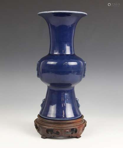 A Chinese porcelain blue monochrome Gu vase, Wanli six-chara...