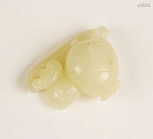 A Chinese pale celadon jade carving, carved to depict a frui...