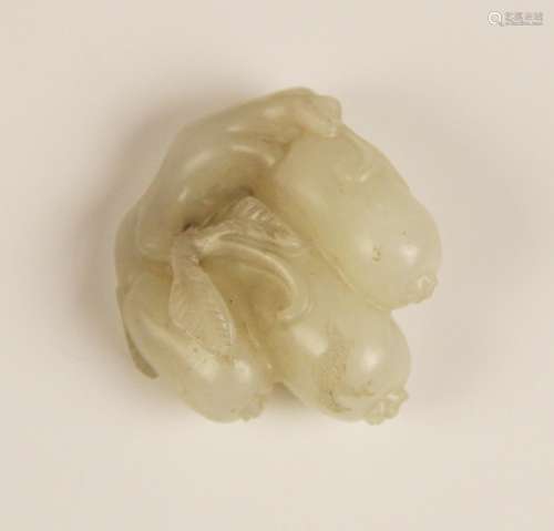 A Chinese pale jade carving, modelled as three gourds descen...