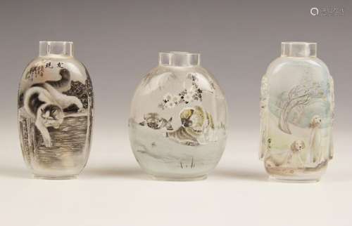 Three Chinese reverse painted snuff bottles, 20th century, c...