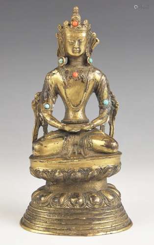 A South East Asian gilt bronze model of Buddha, 19th century...