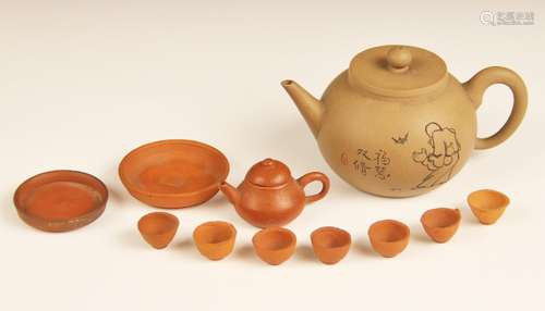 A collection of Chinese miniature Yixing tea wares, comprisi...