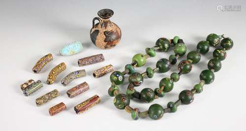 Eleven Venetian glass African trade beads, 19th century, eac...