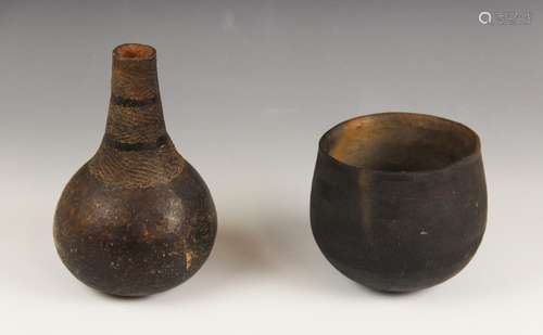 An East African stoneware vessel, Tooro (Uganda), the bulb s...