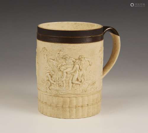 An Adams mug, early 19th century, the cylindrical mug with s...