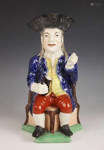 A Staffordshire pottery William Kent type Squire Toby Jug, 1...