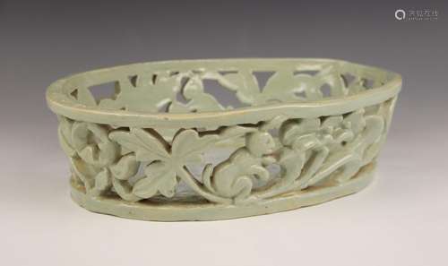 An Art Deco, Art Pottery shallow pierced basket of oval form...