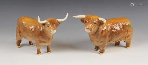 A Beswick Highland Bull, design no. 2008, together with a Be...