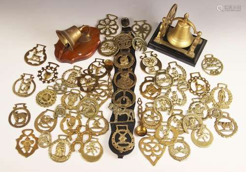 A collection of fifty horse brasses, to include a Manx trisk...