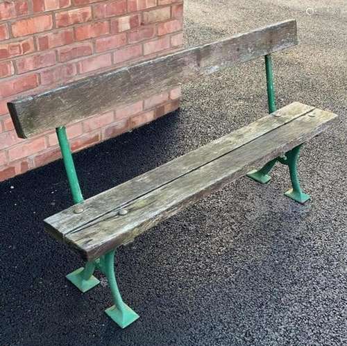 A late 19th century painted iron and hardwood garden bench, ...