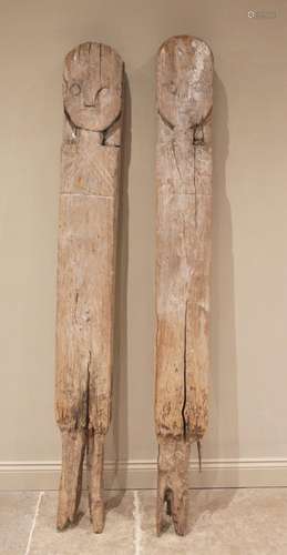 A pair of Indonesian Loro Blonyo gate posts, early 20th cent...