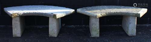 A pair reconstituted stone benches, each of crescent form ra...