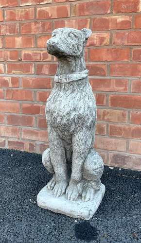 A reconstituted garden figure of an Irish Wolf hound, modell...