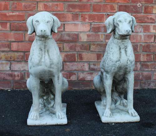 A pair of reconstituted stone garden ornaments, each modelle...