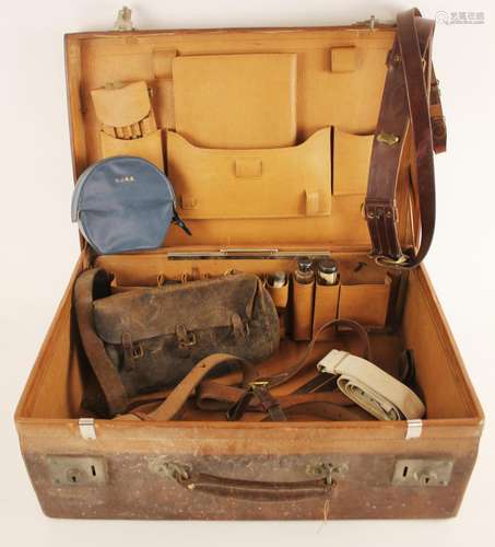 A gentlemans leather suitcase with fitted interior, early 20...